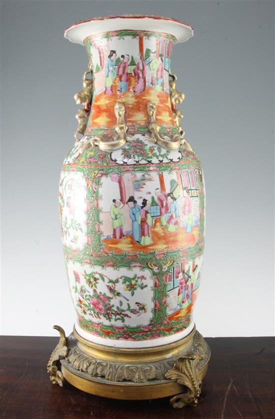 A Chinese Canton-decorated famille rose baluster vase, later 19th century, 55.5cm, base of vase drilled